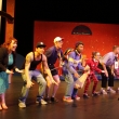 Cast dances together during spelling bee.