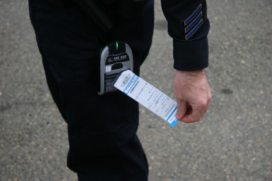 New tickets are printed on the spot with the portable printer. (Photo: Randy McNicol | The Prospector)