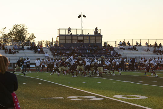 Yuba College ground game runs off tackle | Photo by Bob Barton