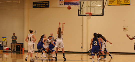 Natalya Stepanchuk attempts a free throw as her teammates and Solano defenders move in | Photo by Bob Barton