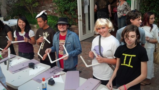 Anime fans take part in a props-workshop to hone their skills at costume-making, stage production, and of course,  prop interaction.