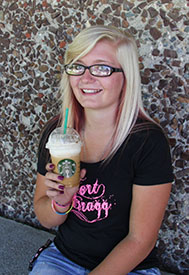 Picture of Desiray drinking Starbucks.