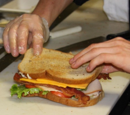 A student finishing a California sandwich.