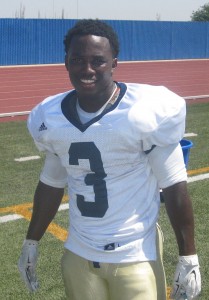 Tyrone Dennis, star running back and kick returner