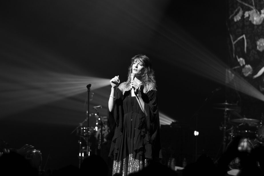 Florence Welch performs on stage.