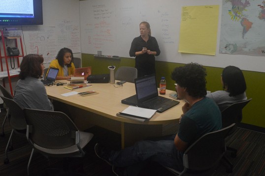 Kiara Koenig leads the Literary Arts Club meeting.