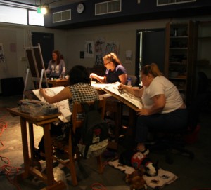 Painting and Drawing students focus on their work.