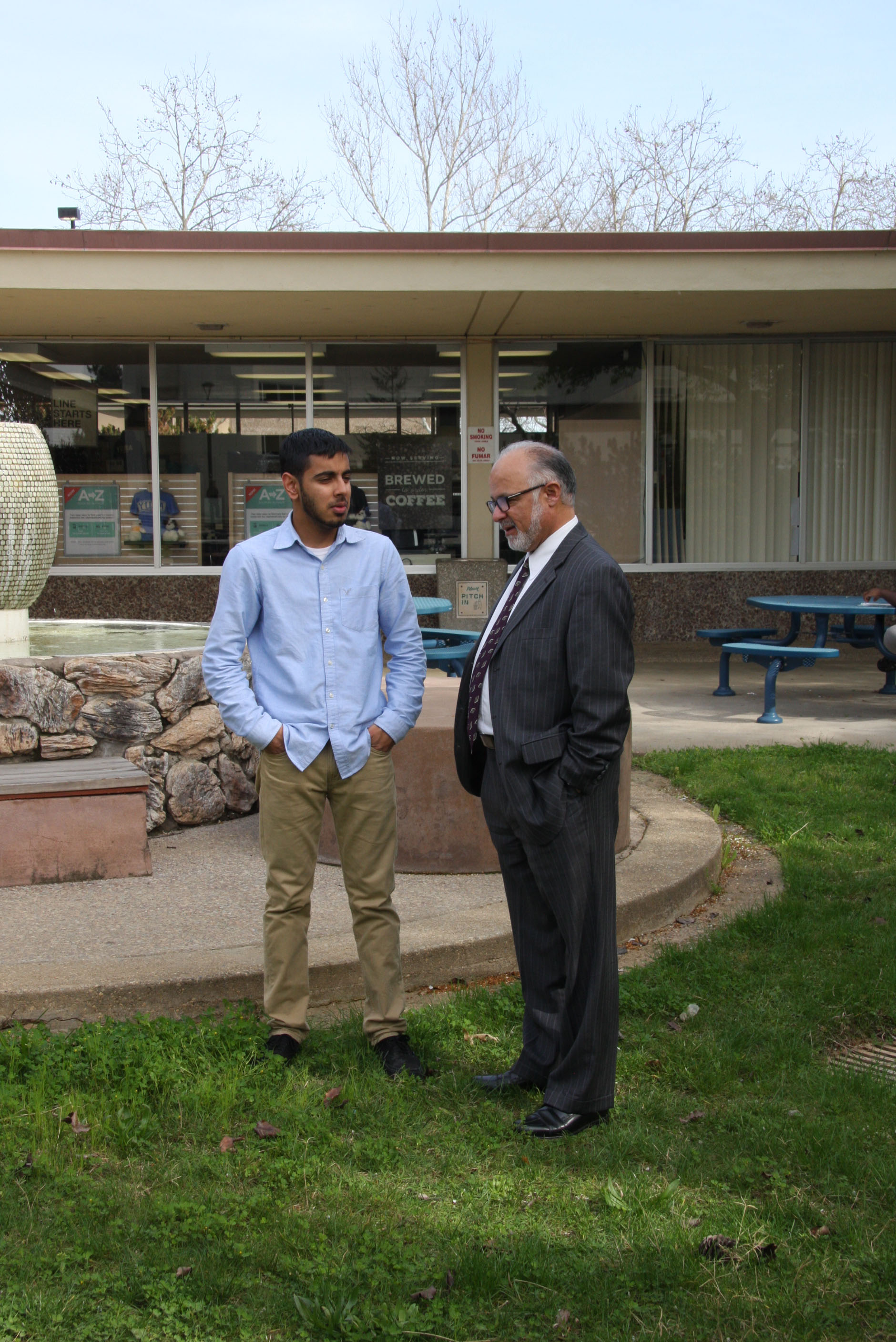 Student reporter Harnek Singh chats with Yuba College President G.H. Javaheripour.