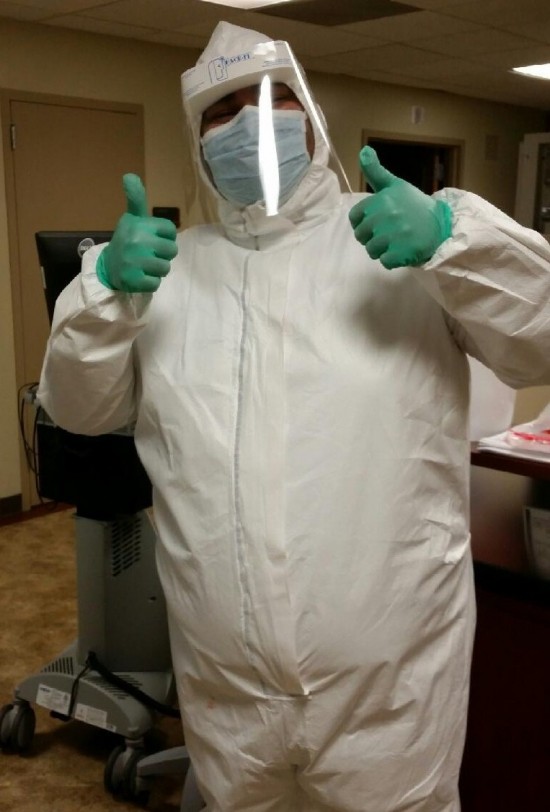 Nicolas wearing an Ebola suit during an Ebola training class.