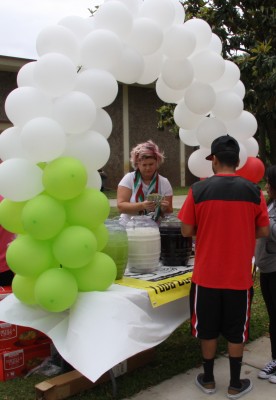 SOY club members sell traditional Mexican drinks during the Cinco de Mayo celebration.