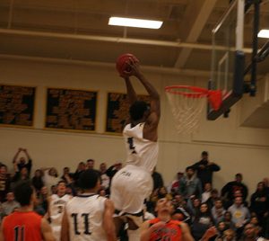 Isaiah Bates throws down a huge dunk against College of the Sequoias.