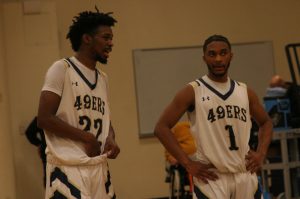 Jeryn Lucas and Elishja Duplechan talk during a free throw.