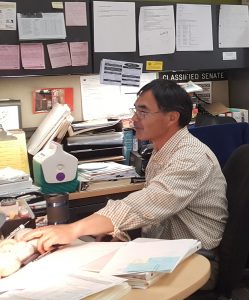 Tony Jow works in his office in the College Success Center.