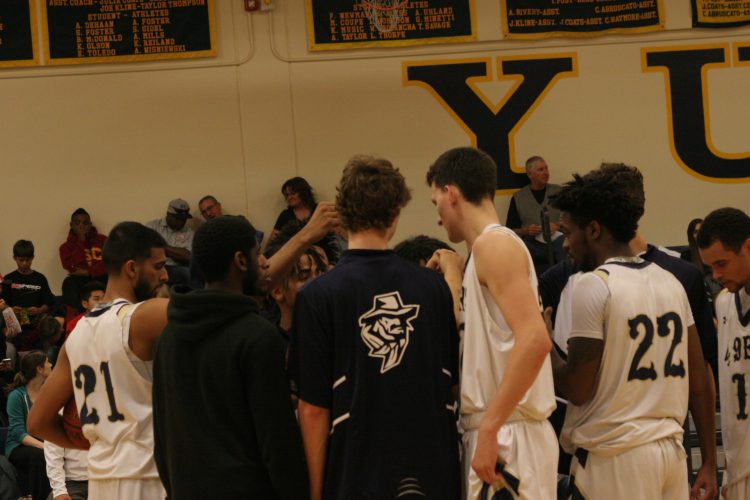 Yuba College Mens Basketball team breaks the huddle in a game against Napa Valley.