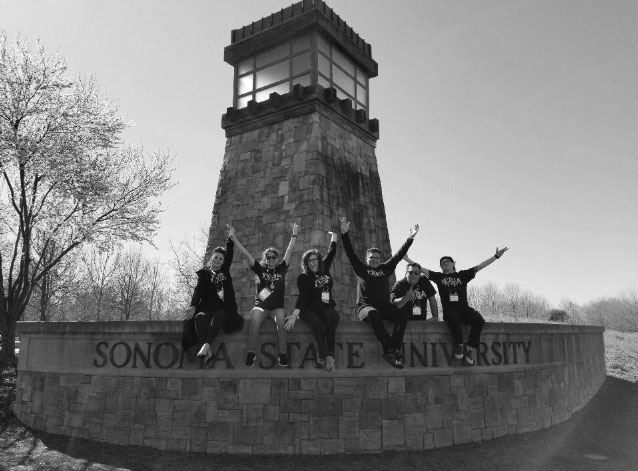 From left to right: Jamie Johnson, Yulisa Castaneda, Jordana Rymel, Adriel Marquez, Kelly Boren and Dylan Nelson posing above the Sonoma State University Light House.