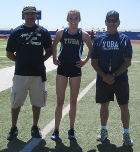 Athlete, coach, and trainer on the Yuba track